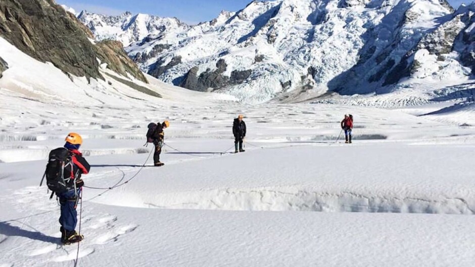 Roped up for glacier travel while walking around crevasses.