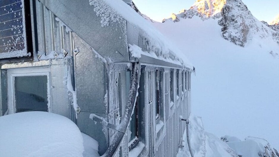 Wild mountain weather. Kelman Hut after a summer storm.