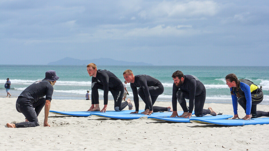 Practicing the technique on the beach before we hit the water