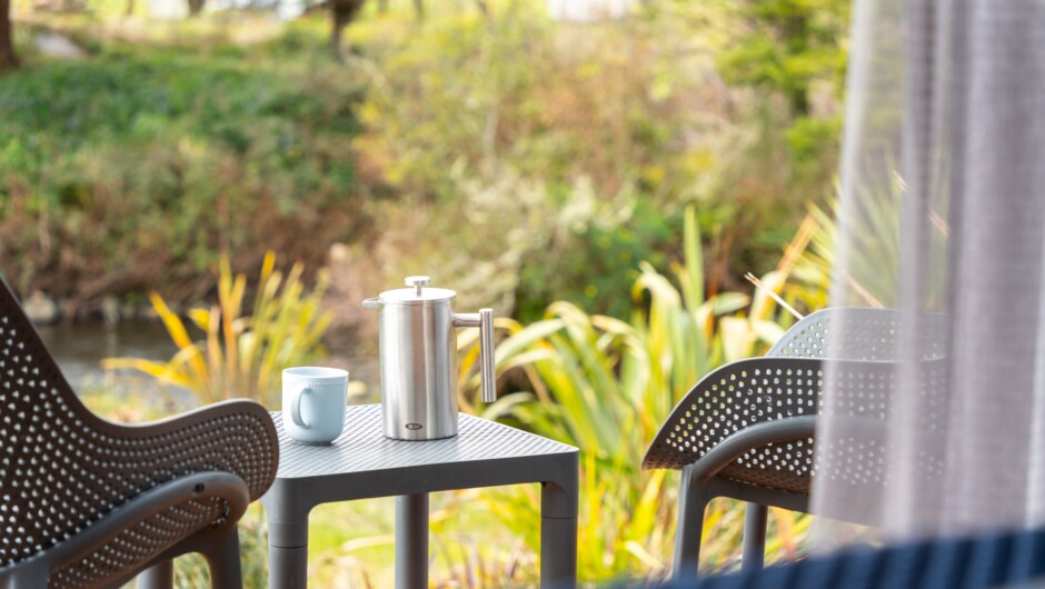 Taking Breakfast on the deck.  The Rua Awa and Mangawhero rooms both have private decks, and private hot tubs with views of mountain and rivers