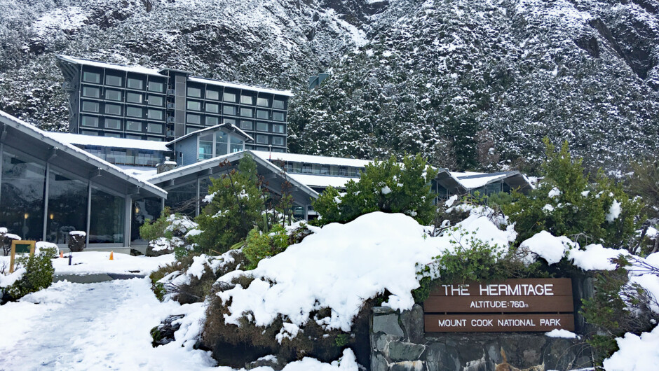 Alpine village in summer snow