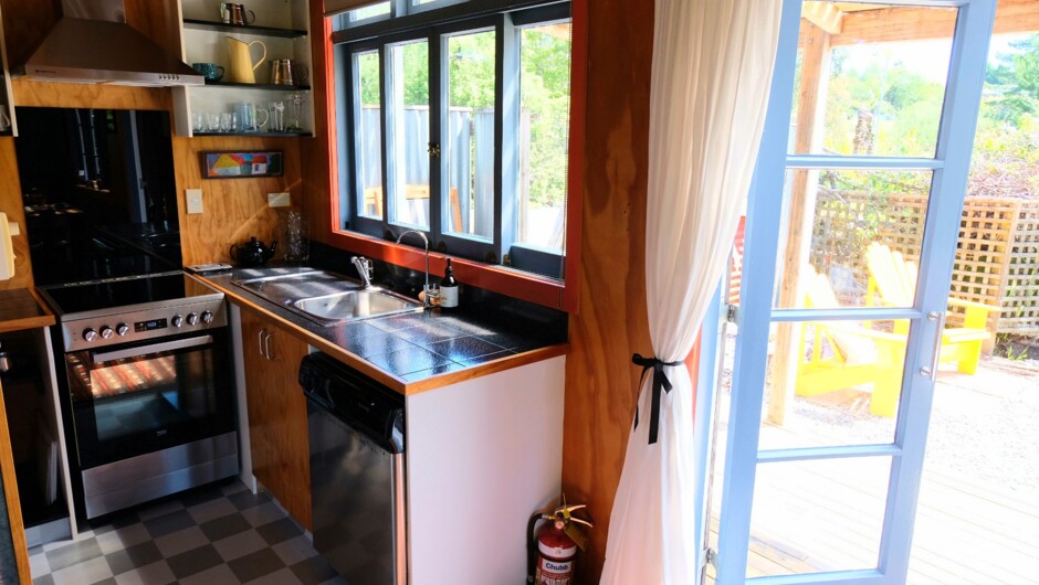 Modern kitchen, sunny warm cottage.