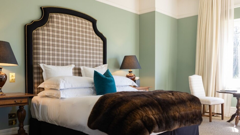 Warm and welcoming rooms with open fires and bespoke New Zealand wool textiles.