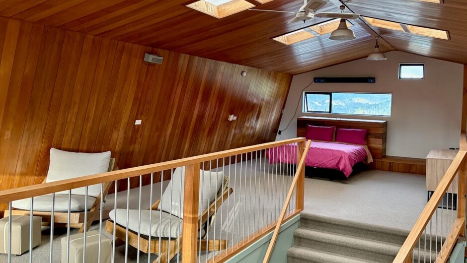 Sleeping and living areas on the open-plan mezzanine