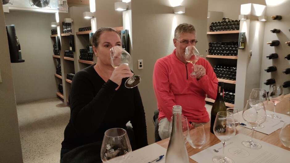 Tasting premium wines in the underground cellar