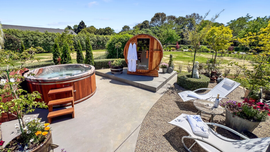 Wellness area, complete with a cedar barrel sauna and outdoor hot tub