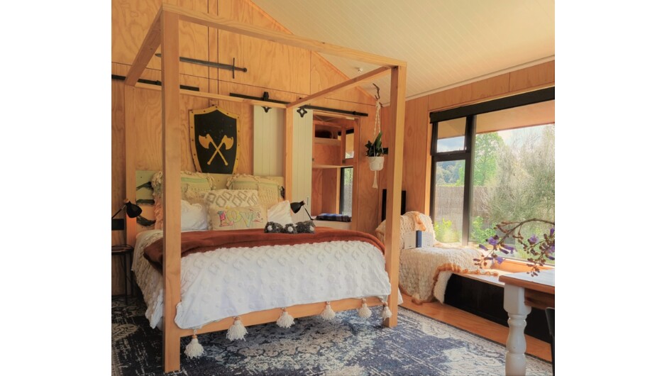 Handcrafted four-poster bed designed for deep rest, unhurried mornings and long, quiet nights.