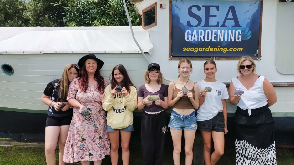 Junior youth group contribute hand crafted Mauri stones to the reef project