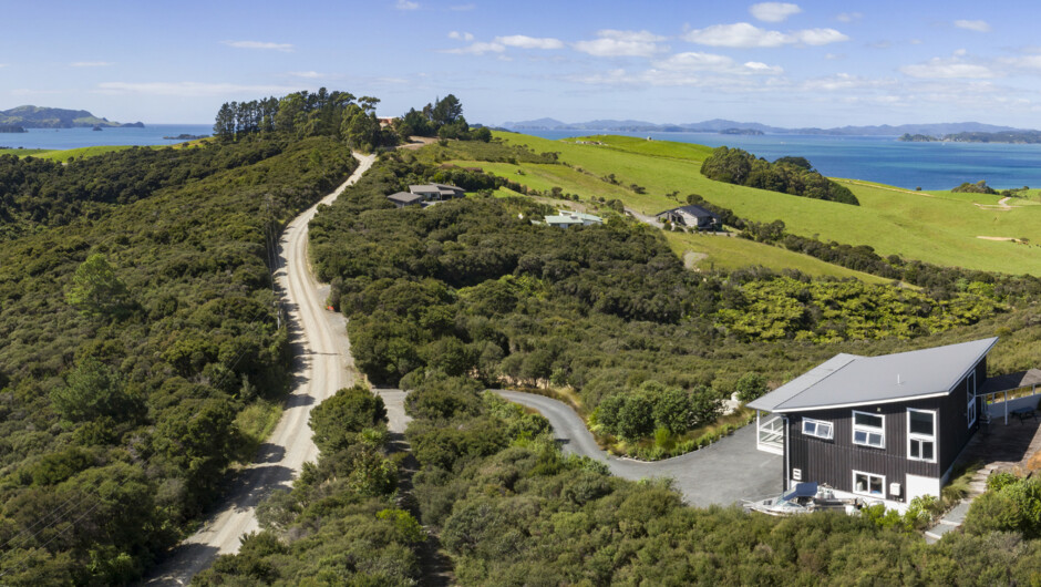 Wharau Lodge holiday home nestled in native bush with views over the Bay of Islands near Kerikeri.
