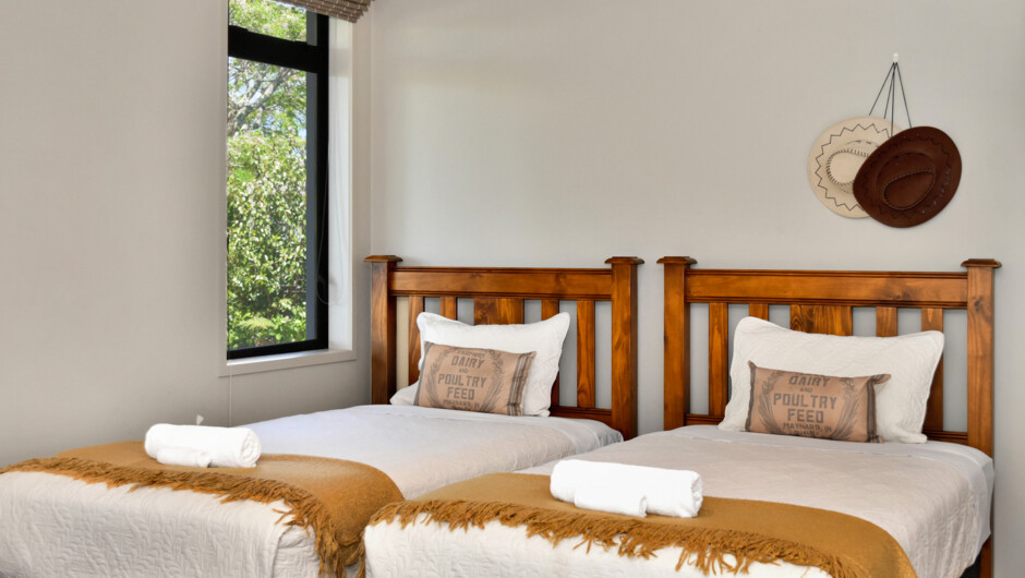 Living room with two king single beds