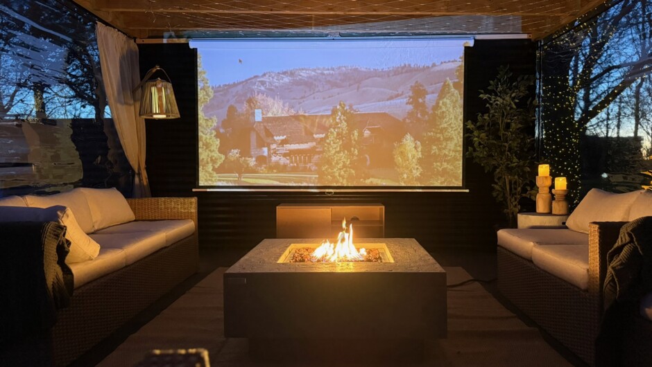 Covered pergola with projector