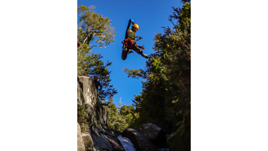 6 metre canyoning jump into Torrent River in the Abel Tasman National Park