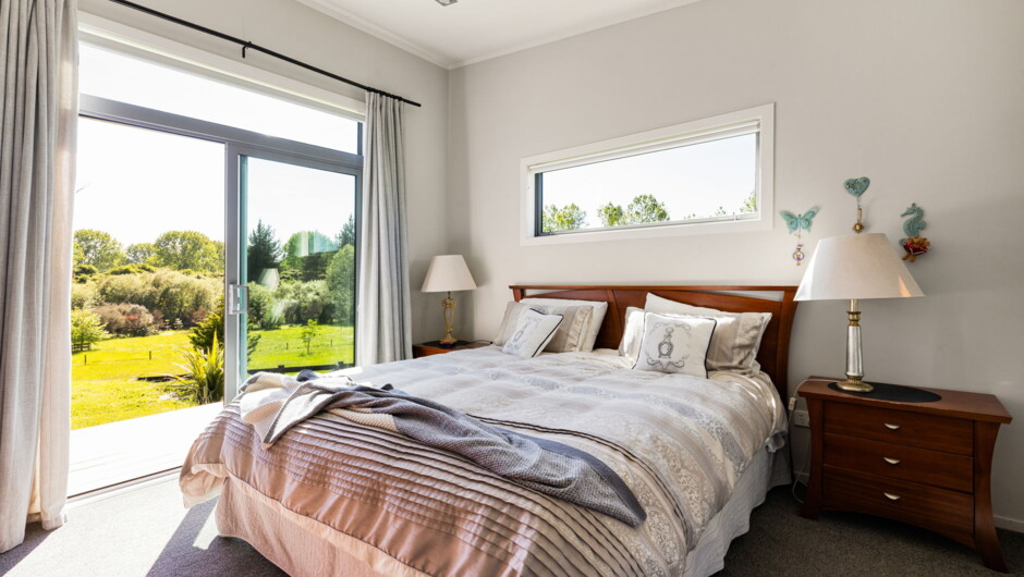 King Bedroom - ensuite and private entrance to deck outside