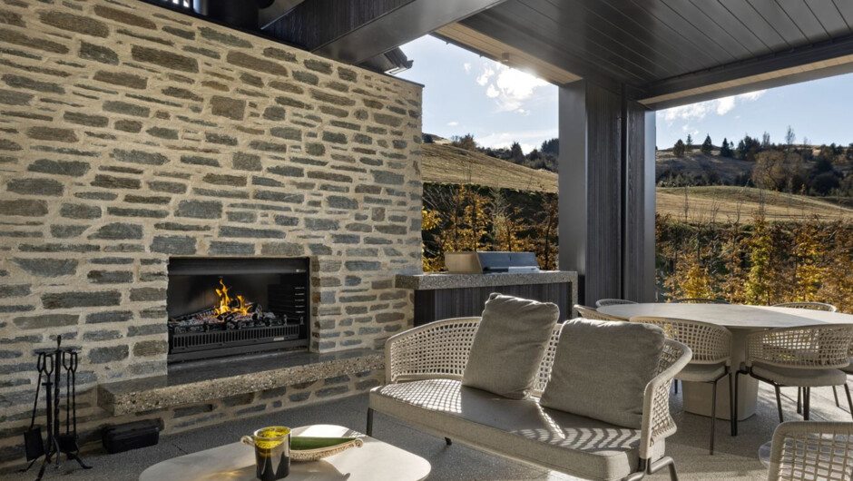Outdoor fireplace and seating area