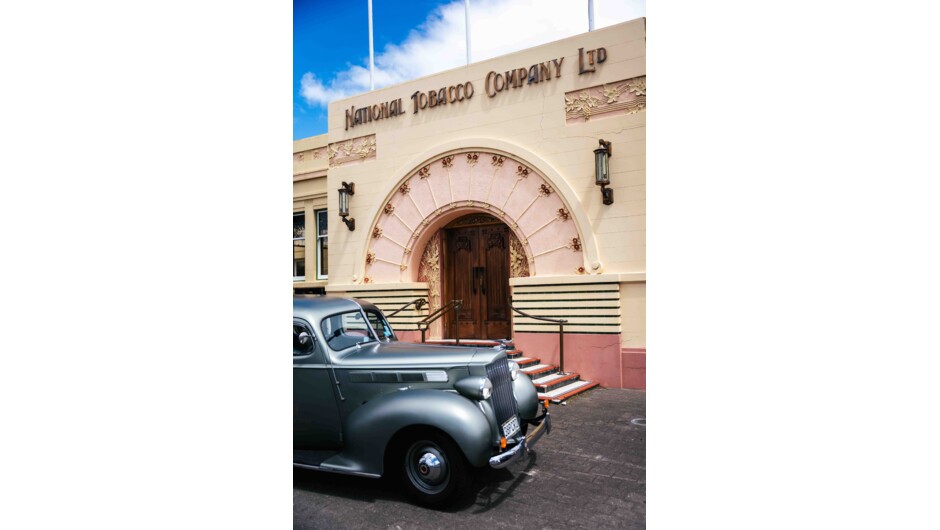 Art Deco Vintage Car at the entrance to the National Tobacco Building