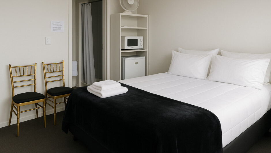 Queen studio| ideal for solo travellers or couples, with a private bathroom and shared kitchen access.