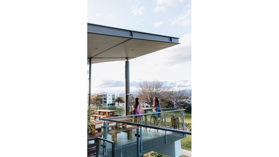 Veranda with enclosed glass fireside room.  Enjoy breathtaking views over the Taylor River and out to the Richmond Ranges.