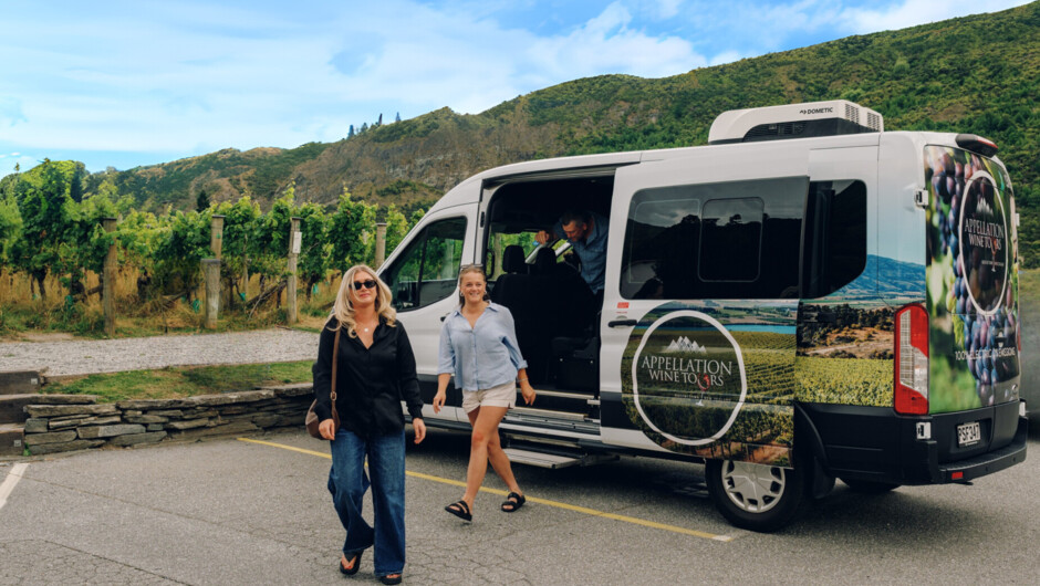 Step out of the van into the luxury vines of Gibbston Valley Winery