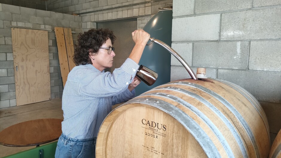 Winemaker in action at Alexia Urban Winery
