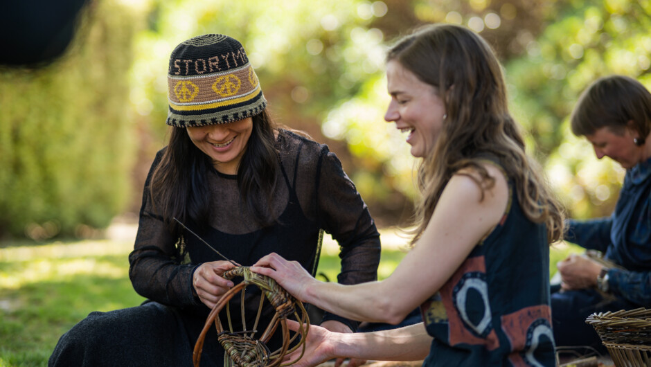 Diana Duncan weaving a frame basket