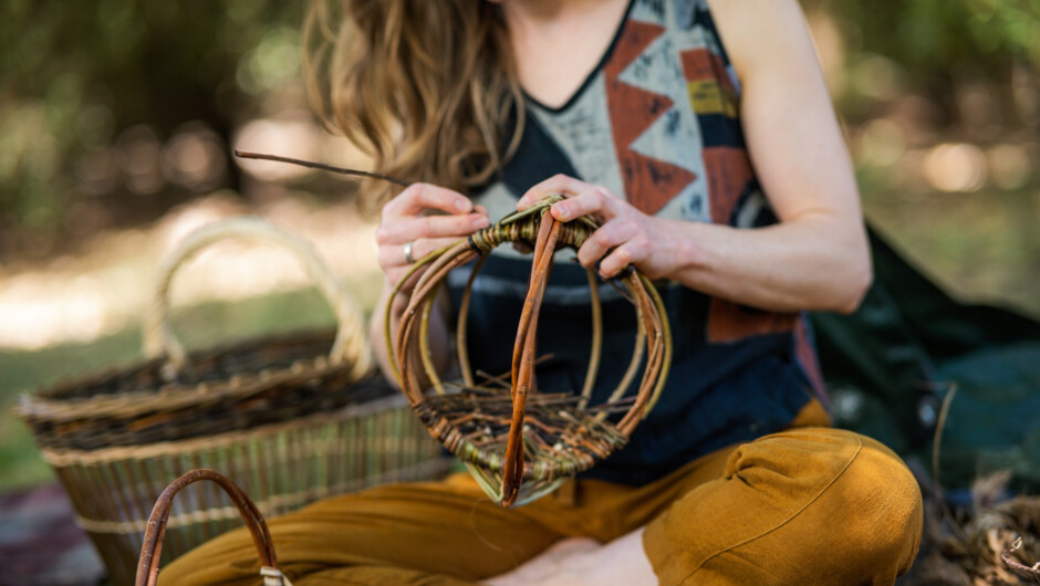Diana Duncan weaving a frame basket