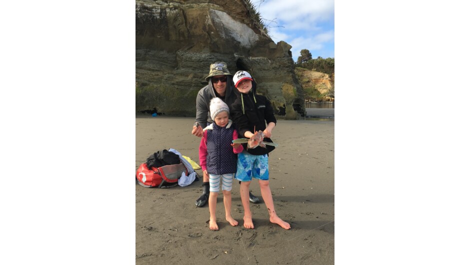 Kids catching gurnard off the beach