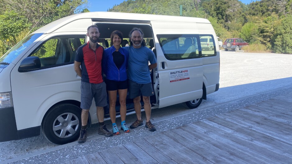 A small group of walkers arriving at Mārahau to begin the Abel Tasman great walk - via a custom shuttle trip with Merv from Tapu Bay Shuttle.