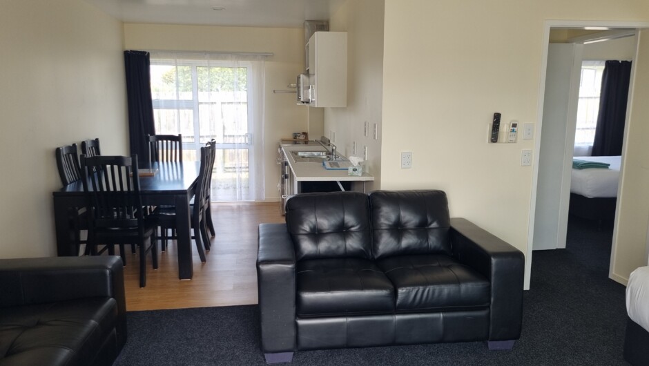 Our family units have full kitchen/dining/lounge.  4 beds that sleep up to 6 guests.