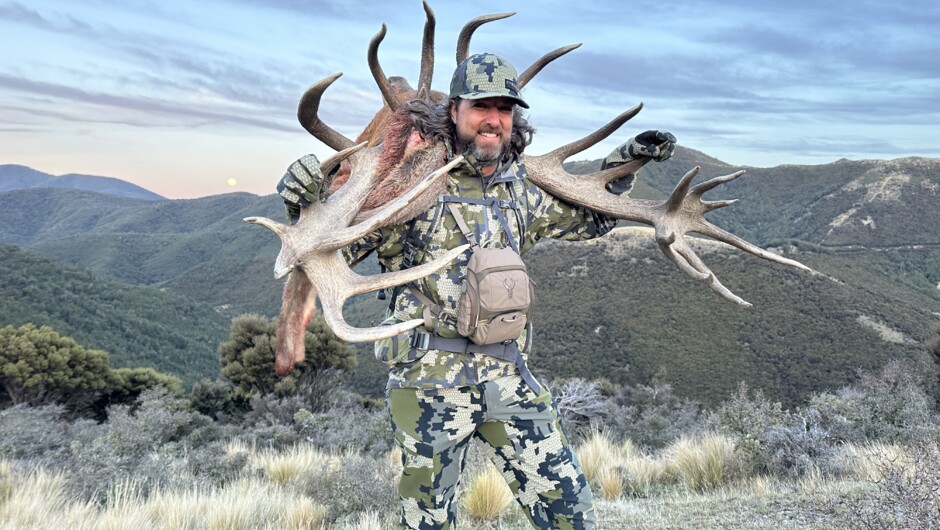 A successful New Zealand red stag hunt in rugged alpine country, with a trophy carried out at last light.
Private guided hunting with Backcountry New Zealand Outfitters — built on experience, effort and genuine backcountry terrain.