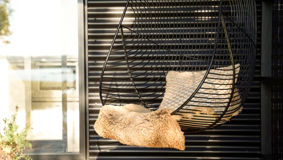 Hanging chair on the cabin deck.