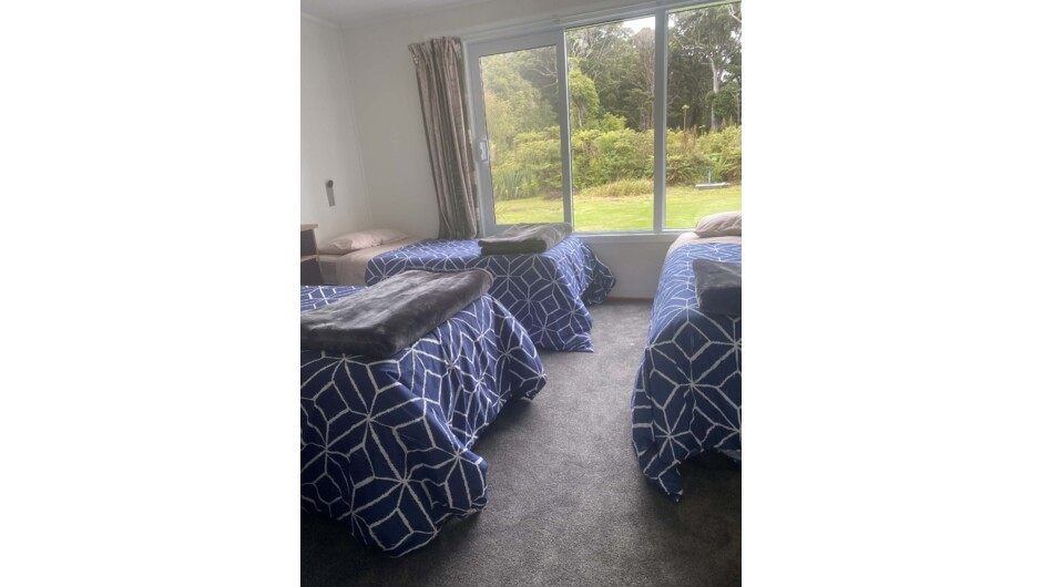 Bedroom with three single beds