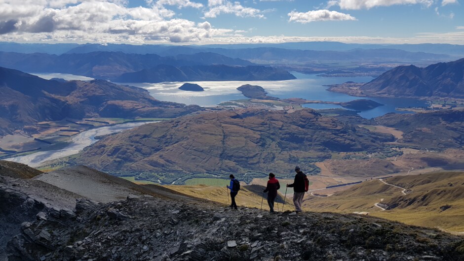 Walking the ridgeline with Lake Wānaka in the background