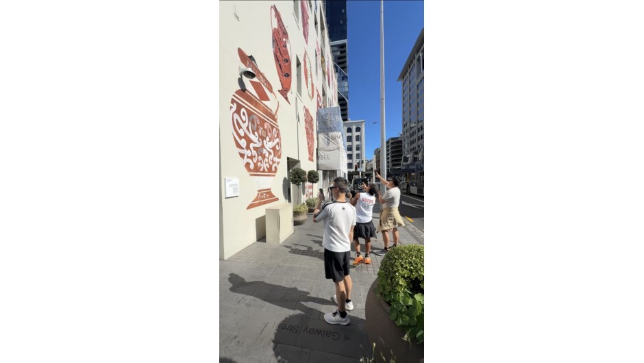 Players exploring Auckland's street art and landmarks during City Decoder