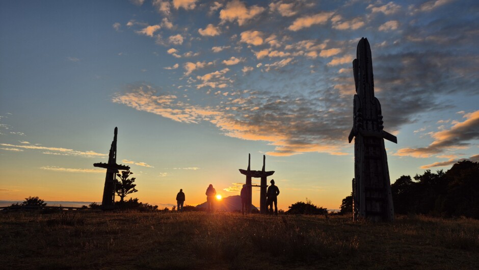 Stand beneath the larger-than-life carvings and feel the spiritual presence of this sacred place. As the first light rises, the legends of Māui come alive on Maunga Hikurangi.