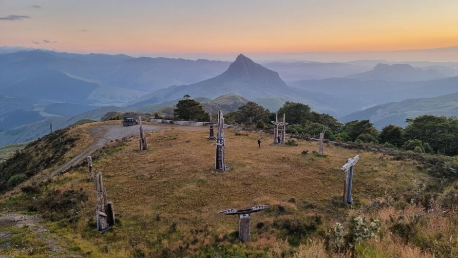 Explore the sacred landscape of Maunga Hikurangi and discover the stories of Ngāti Porou.
Stand among the iconic Māui carvings and take in breathtaking views on this unforgettable cultural journey.