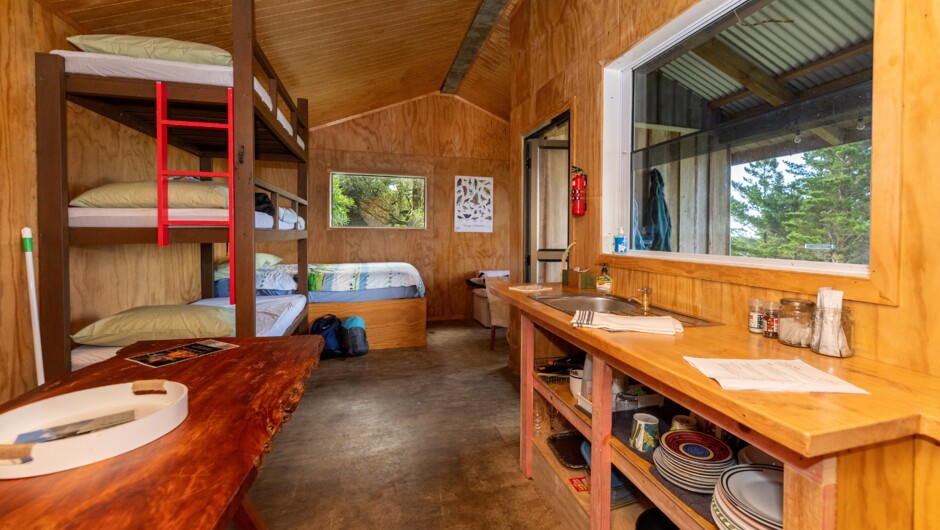 Inside, the Hut sleeps up to 9 persons (although the top bunk is more suitable for children or the very brave)