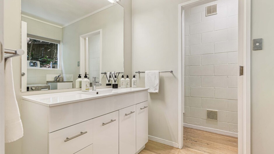 Bathroom with in-unit washer and dryer