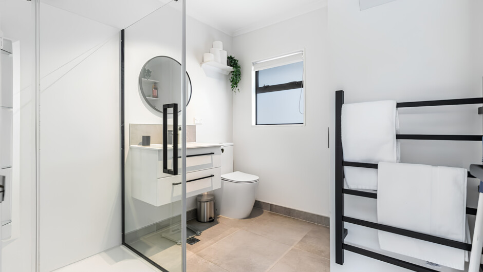 Modern bathroom with towels and high-quality toiletries