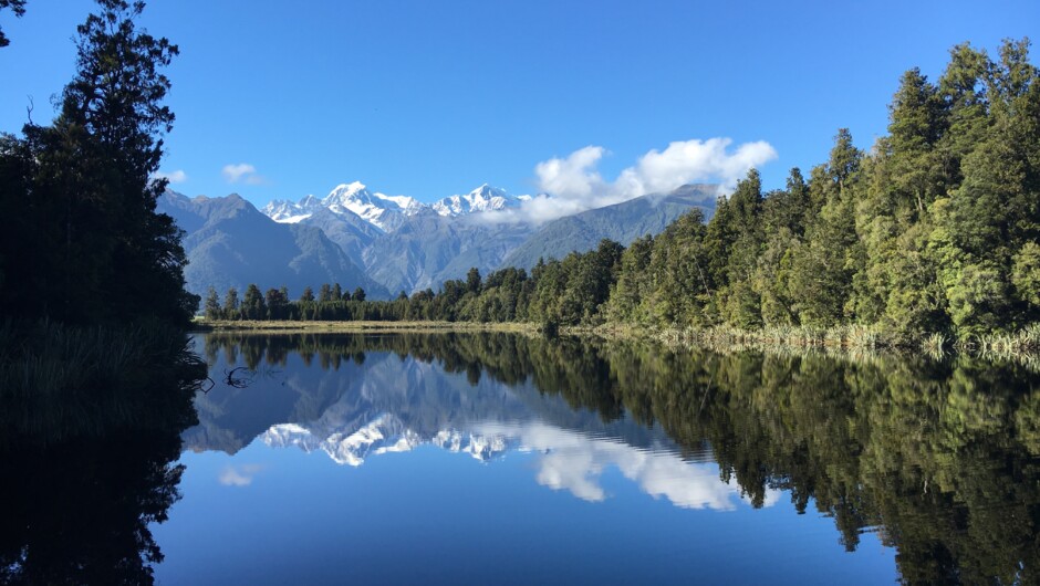 Lake Matheson mirrors the glaciers and Southern Alps on the West Coast