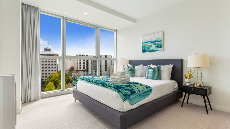 One of the 3 bedrooms of this luxe apartment by Zodiak Stays