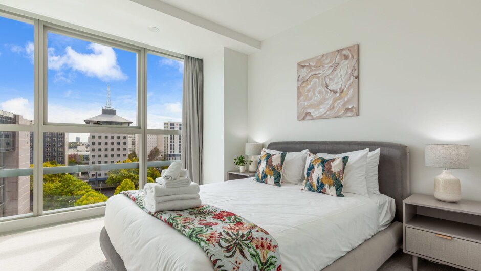 One of the 3 bedrooms of this luxe apartment by Zodiak Stays