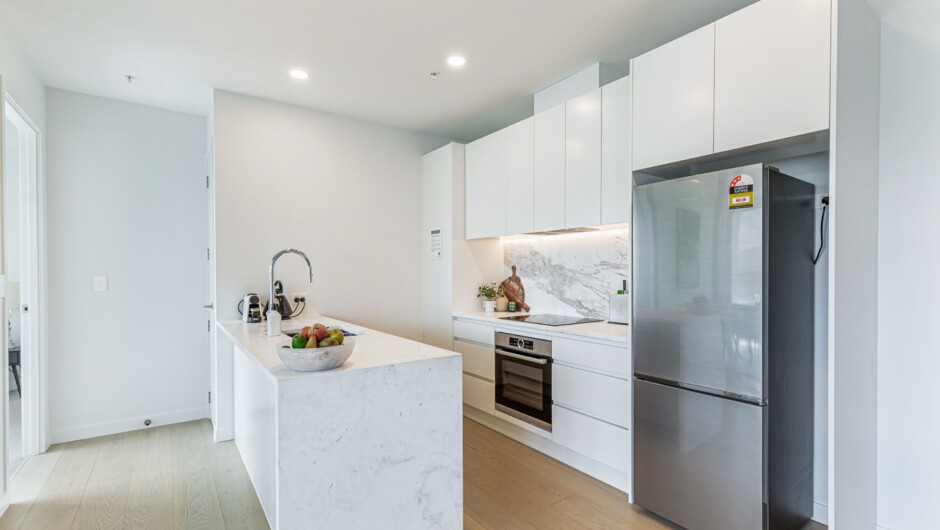 Fully functional Functional kitchen equipped with oven, stove, microwave, fridge, and dishwasher