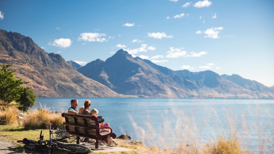 Cycling the Queenstown Gardens peninsula on Lake Wakatipu