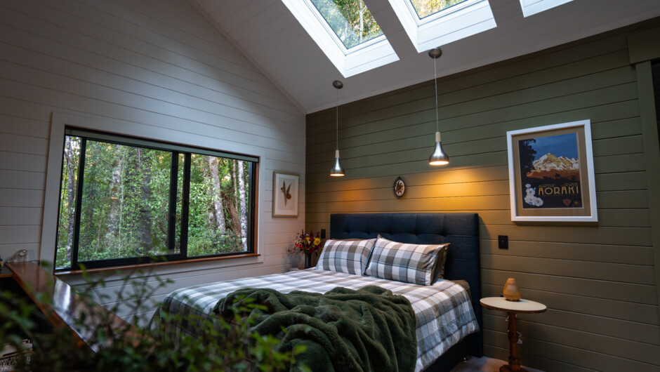 King bed with skylights overhead