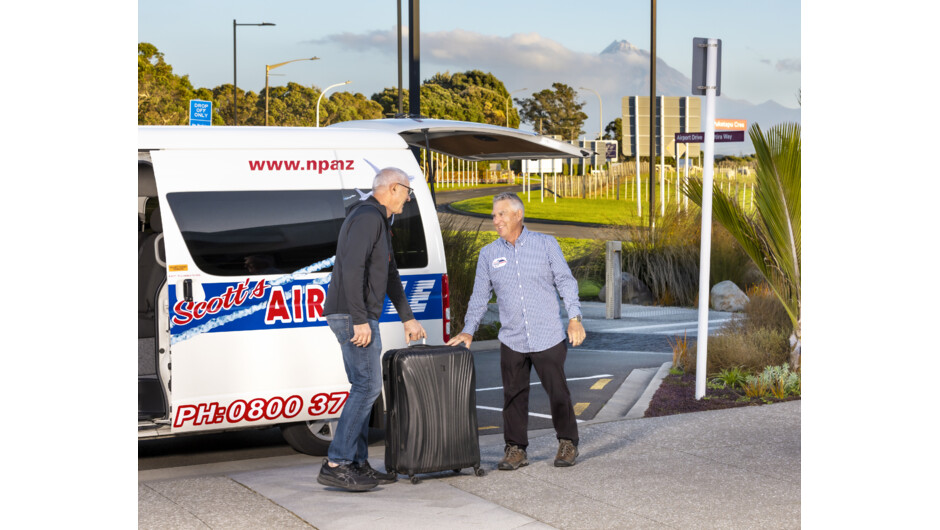 Driver helping customer
