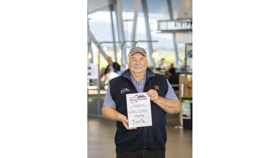 Driver holding sign