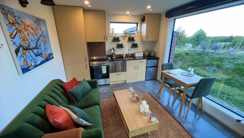 Living, kitchen &amp; dining room with fireplace &amp; beautiful views