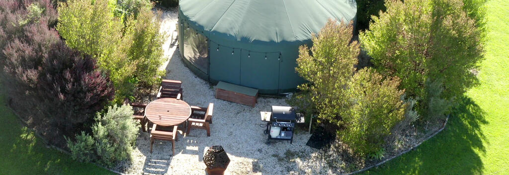 Outdoor dining area with ocean views, BBQ &amp; Fire Pit.
