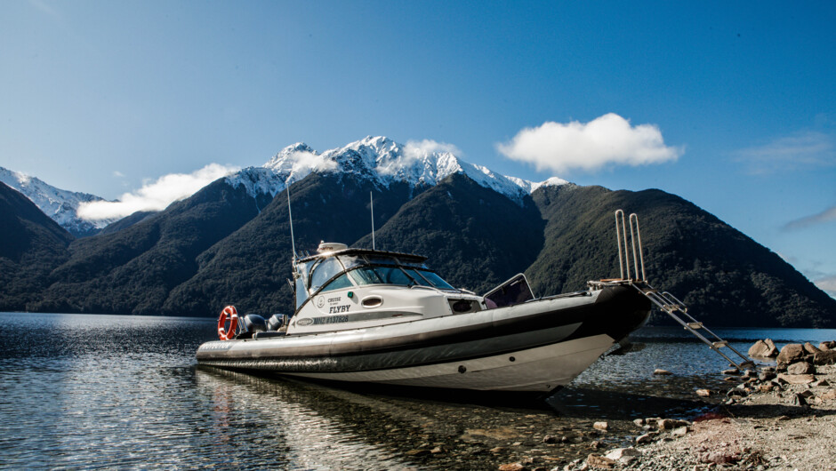Vessel FlyBy at the end of South Fiord Dropping of clients to the Remote Gorge Falls