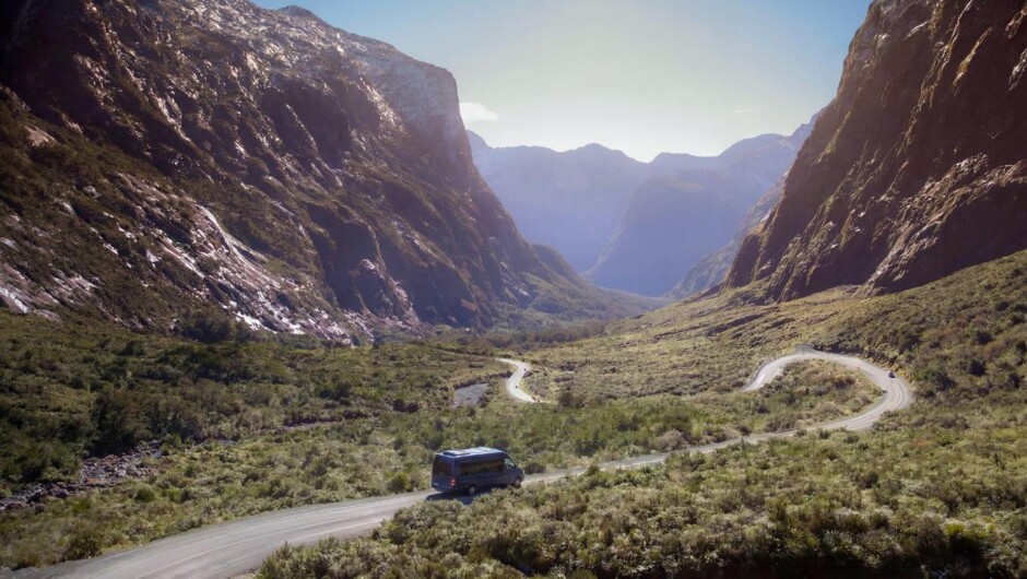 Glass-roof Mercedes Sprinter on the Milford Road